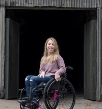 Caitlin in her wheelchair